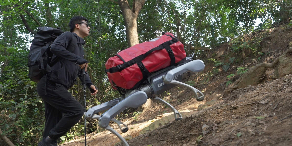 Unitree A2 following a hiker while carrying a bag